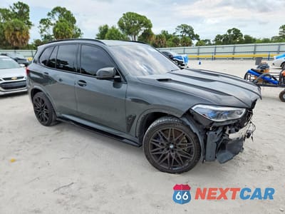 Czwarte zdjęcie samochodu z boku: 2021 BMW X5 M VIN:5YMJU0C08M9H76781 - miniatura