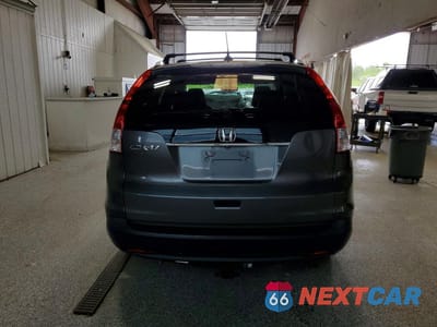 Zdjęcie 6 z 13 samochodu: 2014 HONDA CR-V EXL VIN:2HKRM3H72EH500752 - miniatura