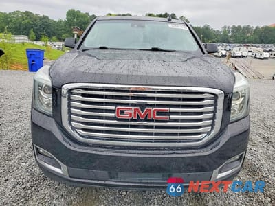 Piąte zdjęcie samochodu w środku: 2019 GMC YUKON SLT VIN:1GKS1BKC8KR324244 - miniatura