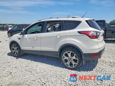Drugie zdjęcie samochodu z przodu: 2017 FORD ESCAPE TITANIUM VIN:1FMCU0JD4HUD24328 - miniatura
