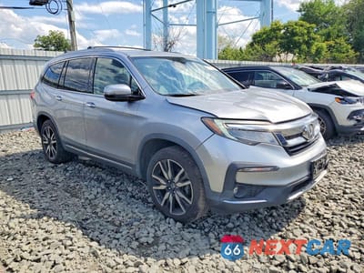 Czwarte zdjęcie samochodu z boku: 2019 HONDA PILOT TOURING VIN:5FNYF6H64KB017241 - miniatura