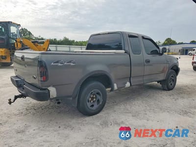 Trzecie zdjęcie samochodu z tyłu: 2002 FORD F150 VIN:1FTRX18W42NB58994 - miniatura