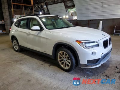 Czwarte zdjęcie samochodu z boku: 2015 BMW X1 XDRIVE28I VIN:WBAVL1C50FVY40377 - miniatura