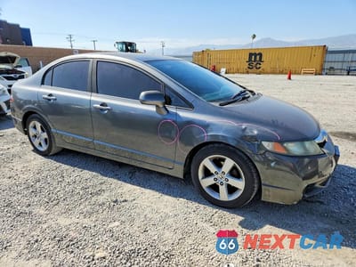 Czwarte zdjęcie samochodu z boku: 2011 HONDA CIVIC LX-S VIN:19XFA1F69BE028110 - miniatura