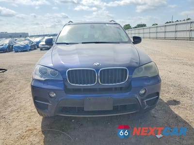 Piąte zdjęcie samochodu w środku: 2012 BMW X5 VIN:5UXZV4C58CL749797 - miniatura