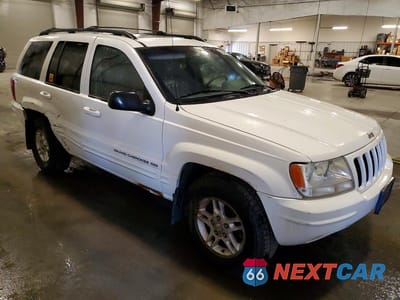 Czwarte zdjęcie samochodu z boku: 2000 JEEP GRAND CHEROKEE LIMITED VIN:1J4GW58N3YC350544 - miniatura