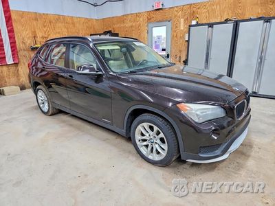 Czwarte zdjęcie samochodu z boku: 2015 BMW X1 XDRIVE28I VIN:WBAVL1C53FVY30975 - miniatura