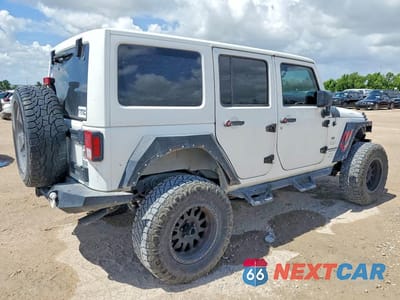Trzecie zdjęcie samochodu z tyłu: 2014 JEEP WRANGLER UNLIMITED SAHARA VIN:1C4HJWEG9EL322926 - miniatura