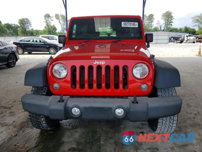 Piąte zdjęcie samochodu w środku: 2016 JEEP WRANGLER UNLIMITED SPORT VIN:1C4BJWKG6GL107534 - miniatura
