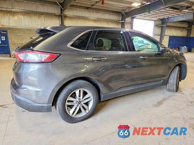 Trzecie zdjęcie samochodu z tyłu: 2016 FORD EDGE SEL VIN:2FMPK4J98GBC25235 - miniatura