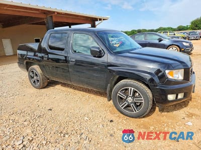 Czwarte zdjęcie samochodu z boku: 2012 HONDA RIDGELINE SPORT VIN:5FPYK1F79CB002026 - miniatura