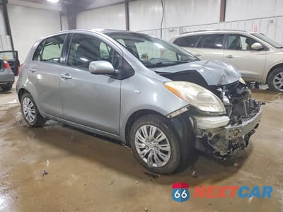 Czwarte zdjęcie samochodu z boku: 2010 TOYOTA YARIS BASE VIN:JTDKT4K36A5290845 - miniatura