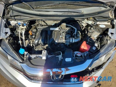 Zdjęcie 11 z 13 samochodu: 2018 HONDA FIT LX VIN:3HGGK5G47JM733841 - miniatura