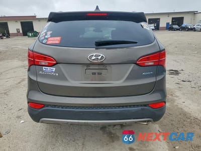 Zdjęcie 6 z 13 samochodu: 2013 HYUNDAI SANTA FE SPORT 2.4L VIN:5XYZU3LB5DG033599 - miniatura