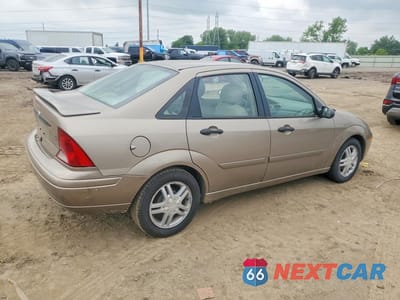 Trzecie zdjęcie samochodu z tyłu: 2003 FORD FOCUS SE VIN:1FAFP34P33W309550 - miniatura