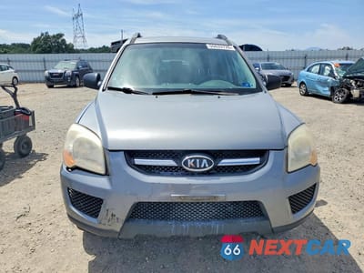 Piąte zdjęcie samochodu w środku: 2010 KIA SPORTAGE LX VIN:KNDKGCA32A7726076 - miniatura