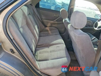 Zdjęcie 10 z 12 samochodu: 1999 TOYOTA CAMRY LE VIN:4T1BG22K5XU435965 - miniatura