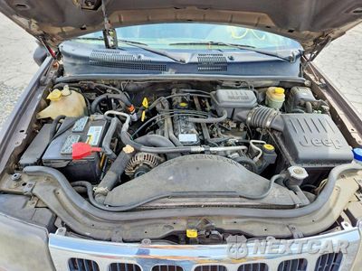 Zdjęcie 12 z 13 samochodu: 2001 JEEP GRAND CHEROKEE LAREDO VIN:1J4GX48S01C537985 - miniatura