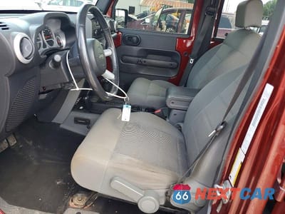 Zdjęcie 7 z 13 samochodu: 2009 JEEP WRANGLER UNLIMITED SAHARA VIN:1J4GA59179L767158 - miniatura