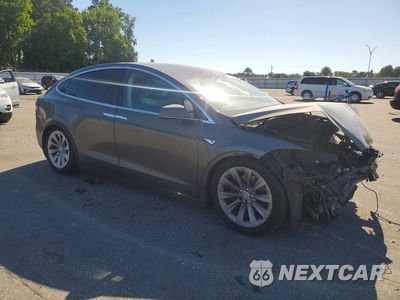 Czwarte zdjęcie samochodu z boku: 2016 TESLA MODEL X VIN:5YJXCBE20GF005867 - miniatura