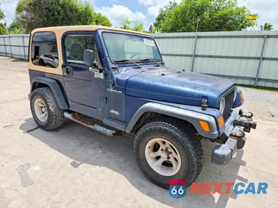 Czwarte zdjęcie samochodu z boku: 2000 JEEP WRANGLER / TJ SE VIN:1J4FA29P2YP771267 - miniatura