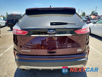 Zdjęcie 6 z 14 samochodu: 2020 FORD EDGE SEL VIN:2FMPK3J97LBA13480 - miniatura