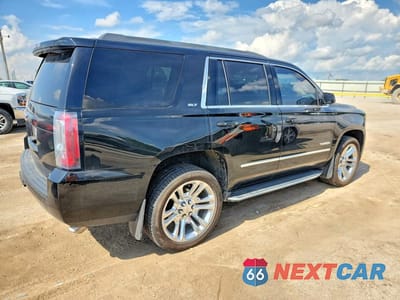 Trzecie zdjęcie samochodu z tyłu: 2018 GMC YUKON SLT VIN:1GKS2BKC4JR318520 - miniatura