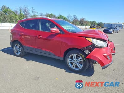 Czwarte zdjęcie samochodu z boku: 2012 HYUNDAI TUCSON GLS VIN:KM8JUCAC0CU456138 - miniatura
