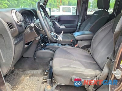 Zdjęcie 7 z 12 samochodu: 2014 JEEP WRANGLER UNLIMITED RUBICON VIN:1C4BJWFG1EL214403 - miniatura