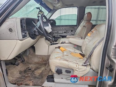 Zdjęcie 7 z 14 samochodu: 2002 GMC YUKON VIN:1GKEC13Z12J235540 - miniatura