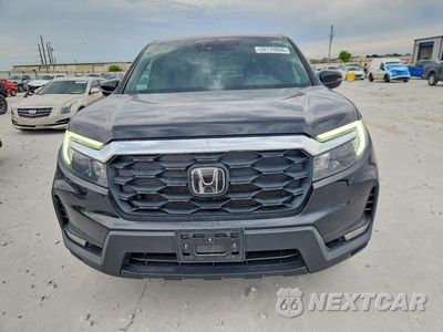 Piąte zdjęcie samochodu w środku: 2022 HONDA PASSPORT EXL VIN:5FNYF8H52NB002759 - miniatura
