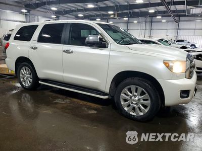 Czwarte zdjęcie samochodu z boku: 2014 TOYOTA SEQUOIA PLATINUM VIN:5TDDW5G12ES102271 - miniatura