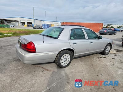Trzecie zdjęcie samochodu z tyłu: 2005 MERCURY GRAND MARQUIS GS VIN:2MEFM74WX5X620982 - miniatura