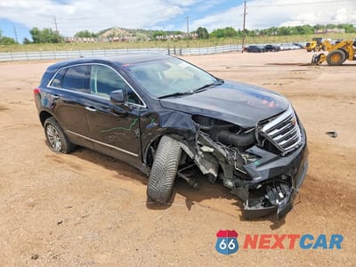 Czwarte zdjęcie samochodu z boku: 2019 CADILLAC XT5 LUXURY VIN:1GYKNDRSXKZ291895 - miniatura
