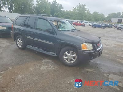 Czwarte zdjęcie samochodu z boku: 2003 GMC ENVOY VIN:1GKDT13S532308029 - miniatura