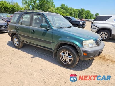Czwarte zdjęcie samochodu z boku: 1999 HONDA CR-V EX VIN:JHLRD1864XC050423 - miniatura