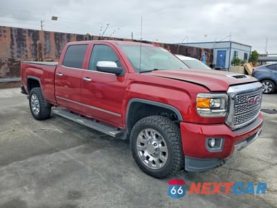 Czwarte zdjęcie samochodu z boku: 2019 GMC SIERRA K2500 DENALI VIN:1GT12SEY9KF210945 - miniatura