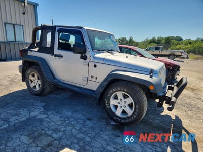 Czwarte zdjęcie samochodu z boku: 2009 JEEP WRANGLER X VIN:1J4FA24159L718087 - miniatura