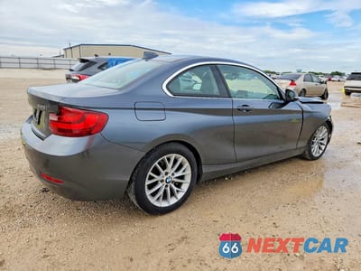 Trzecie zdjęcie samochodu z tyłu: 2014 BMW 228 I VIN:WBA1F5C55EVV99167 - miniatura