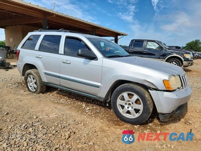 Czwarte zdjęcie samochodu z boku: 2009 JEEP GRAND CHEROKEE LAREDO VIN:1J8GS48K39C545412 - miniatura