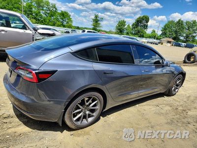 Trzecie zdjęcie samochodu z tyłu: 2021 TESLA MODEL 3 VIN:5YJ3E1EA6MF016779 - miniatura