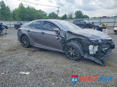 Czwarte zdjęcie samochodu z boku: 2024 TOYOTA CAMRY HYBRID SE VIN:4T1G31AKXRU068528 - miniatura