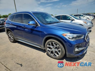 Czwarte zdjęcie samochodu z boku: 2021 BMW X1 XDRIVE28I VIN:WBXJG9C04M5T33040 - miniatura