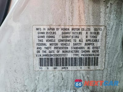 Zdjęcie 12 z 12 samochodu: 2013 HONDA FIT VIN:JHMGE8H32DC037017 - miniatura