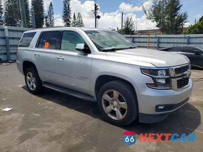 Czwarte zdjęcie samochodu z boku: 2016 CHEVROLET TAHOE C1500 LT VIN:1GNSCBKC0GR449498 - miniatura