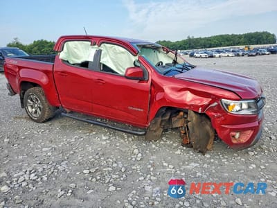 Czwarte zdjęcie samochodu z boku: 2019 CHEVROLET COLORADO Z71 VIN:1GCGTDEN8K1216483 - miniatura