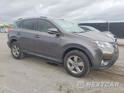 Czwarte zdjęcie samochodu z boku: 2015 TOYOTA RAV4 XLE VIN:JTMWFREV1FJ037787 - miniatura