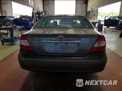Zdjęcie 6 z 13 samochodu: 2003 TOYOTA CAMRY LE VIN:4T1BE30K33U758372 - miniatura