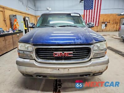 Piąte zdjęcie samochodu w środku: 1999 GMC NEW SIERRA K1500 VIN:2GTEK19TXX1548007 - miniatura