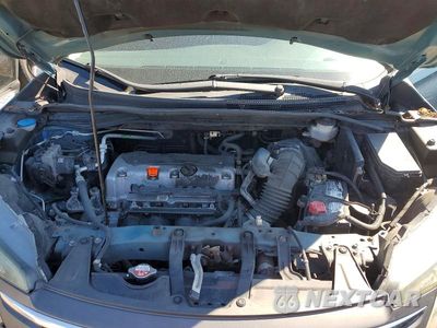 Zdjęcie 12 z 13 samochodu: 2014 HONDA CR-V LX VIN:2HKRM4H39EH673266 - miniatura